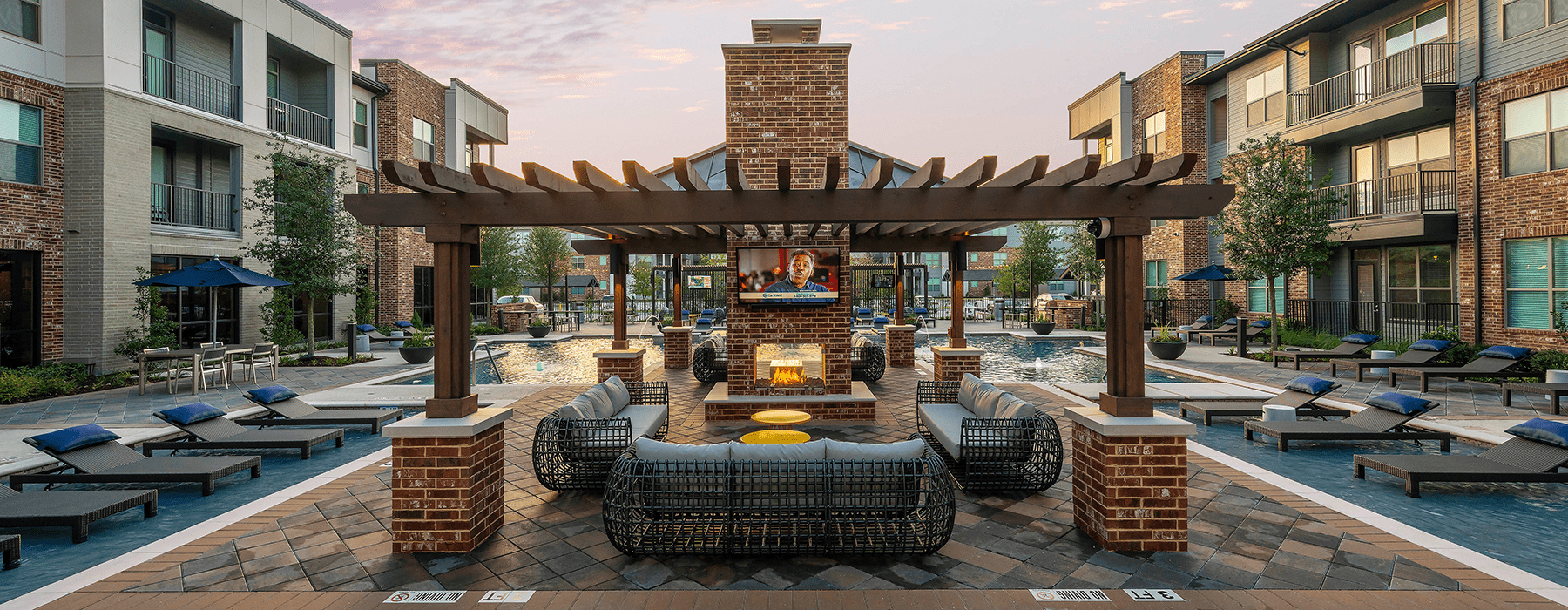 outdoor area with firepits, seating for relaxing and open spaces